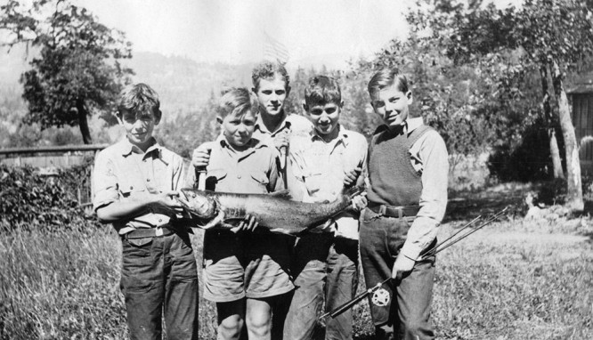 1930s campers pose with trophy salmon