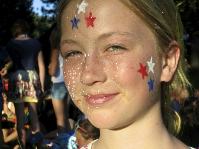 camper with face paint decoration for the 4th of July
